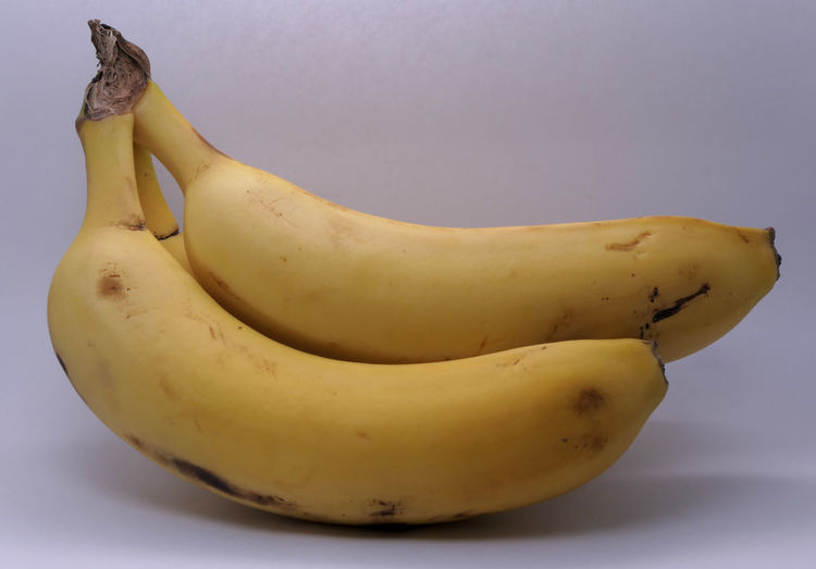 Close-up of banana against white background