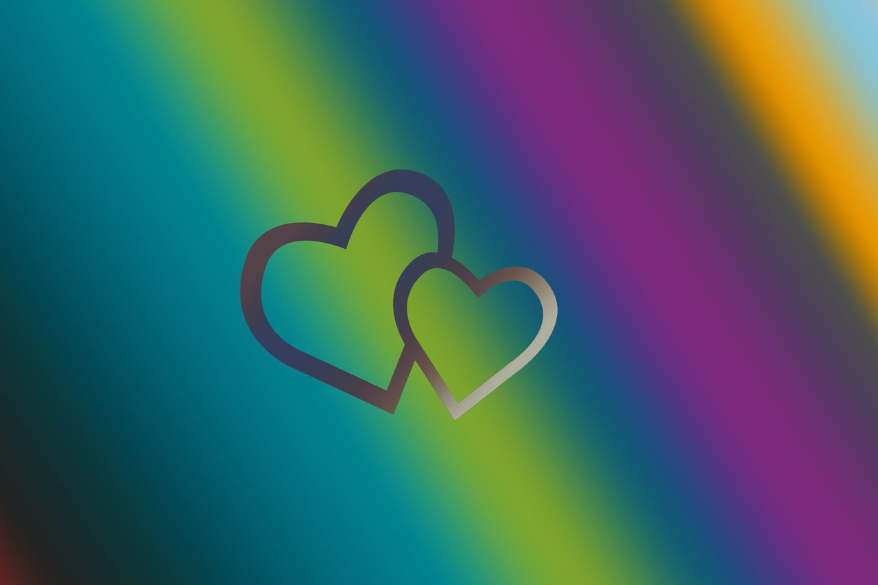 CLOSE-UP OF MULTI COLORED HEART SHAPE MADE OF GREEN