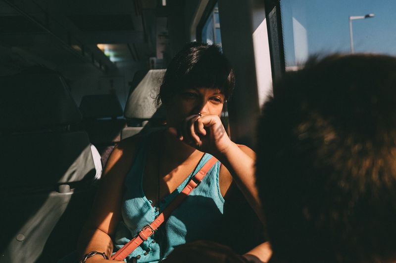 Portrait of woman on train