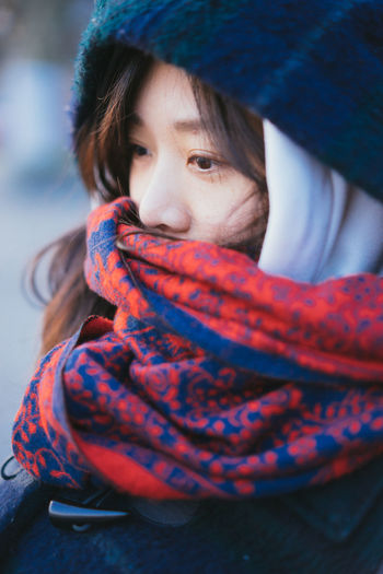 Close-up portrait of asian girl in winter