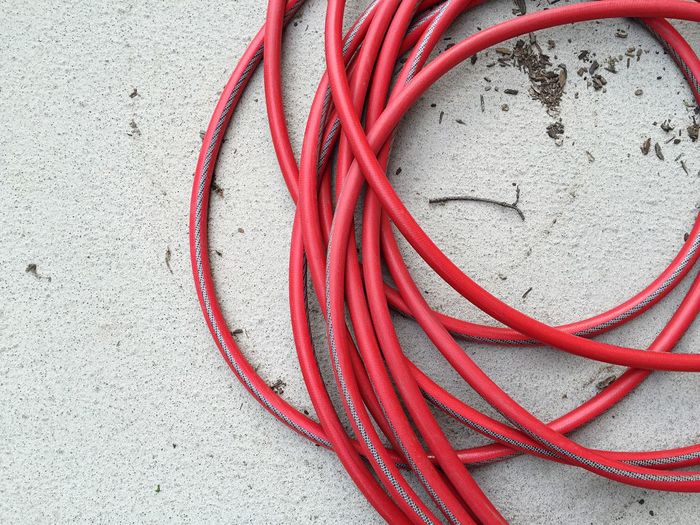 Close up of red cables on floor