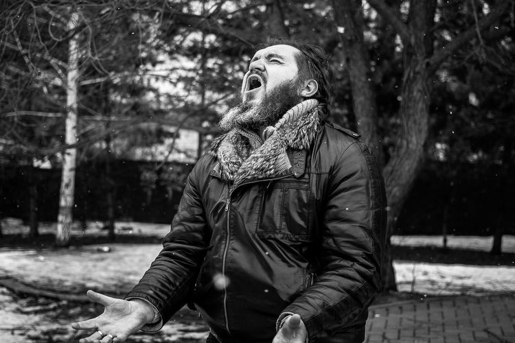 Man screaming outdoors