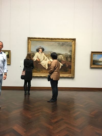 Full length of couple standing in museum