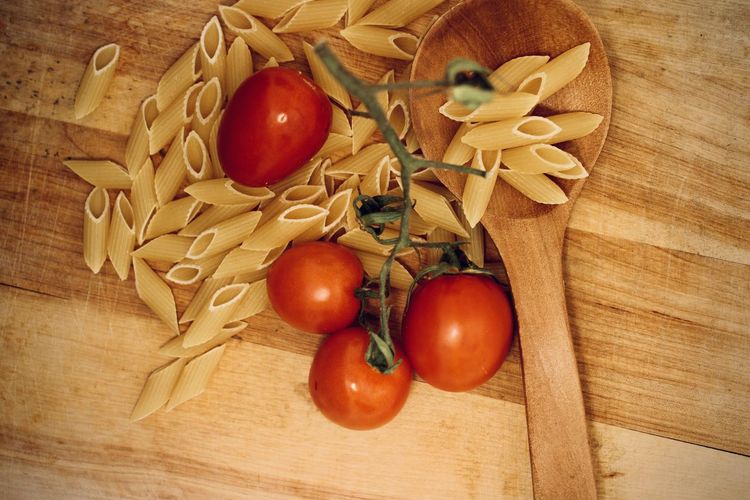 High angle view of tomatoes on cutting board