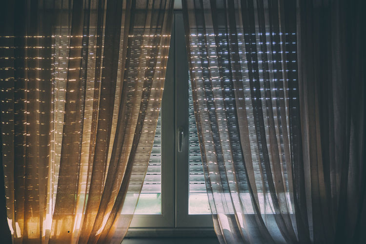 Sunlight streaming through glass window