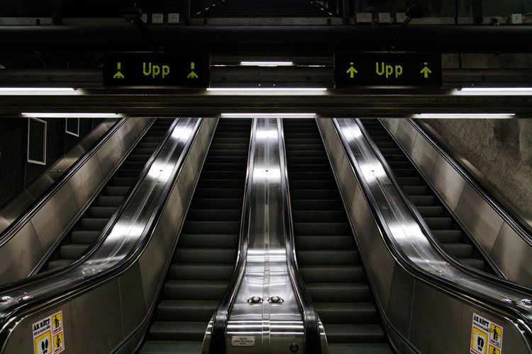 Low angle view of empty escalators at subway station