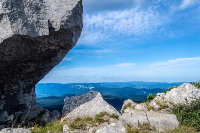 Scenic view of rock formations against sky. risnjak