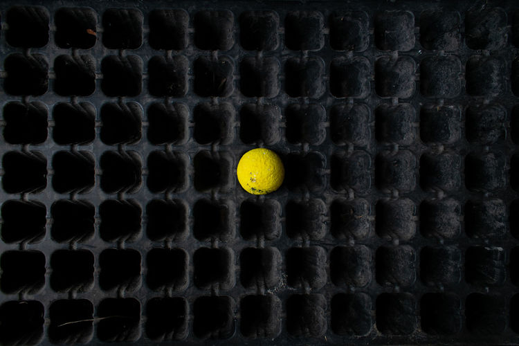  yellow ball on center of crate