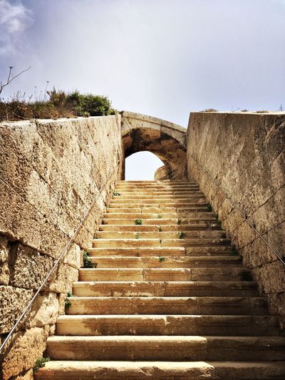 Low angle view of steps against clear sky