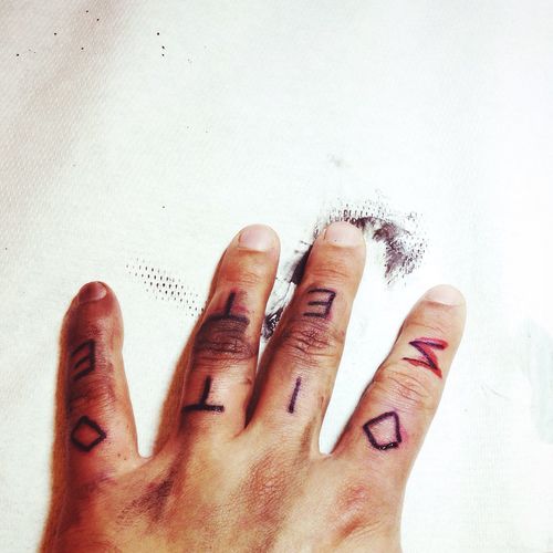 Close-up of hand over white background