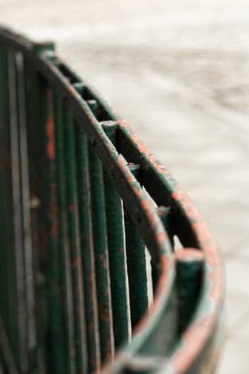 Close-up of rusty metal railing against sea