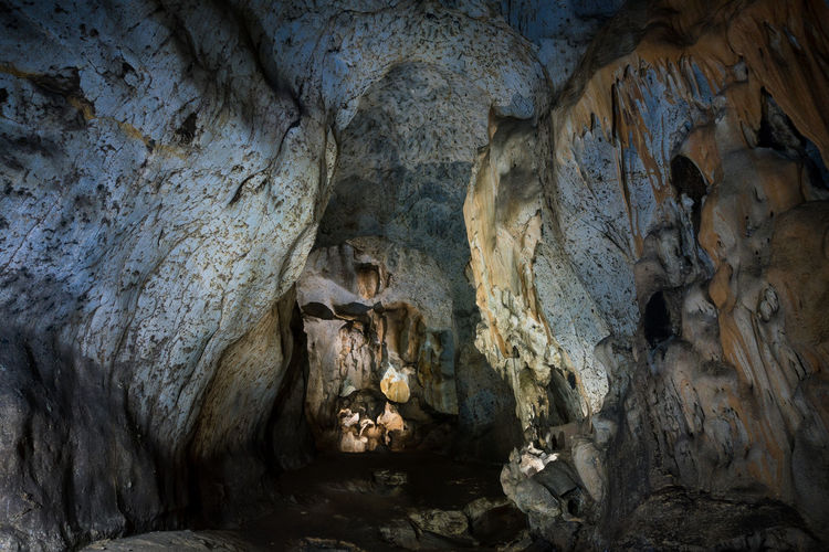 Low angle view of rock formation inside limestone cave
