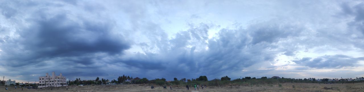 Panoramic view of storm clouds over land