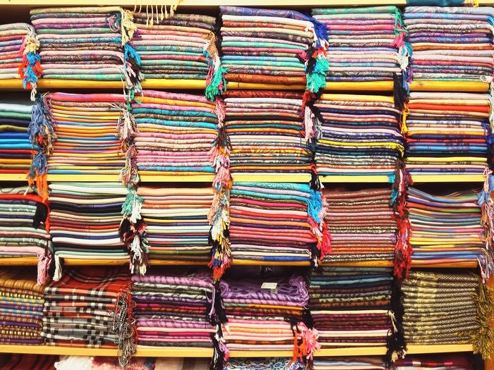 Full frame shot of multi colored fabrics/scarves in store