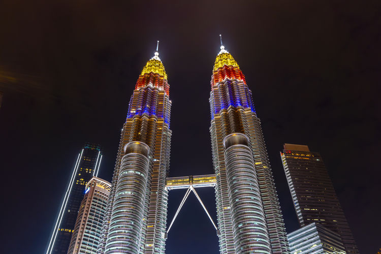 Klcc twin tower lighted up with beautiful national flag colours celebrating independence day