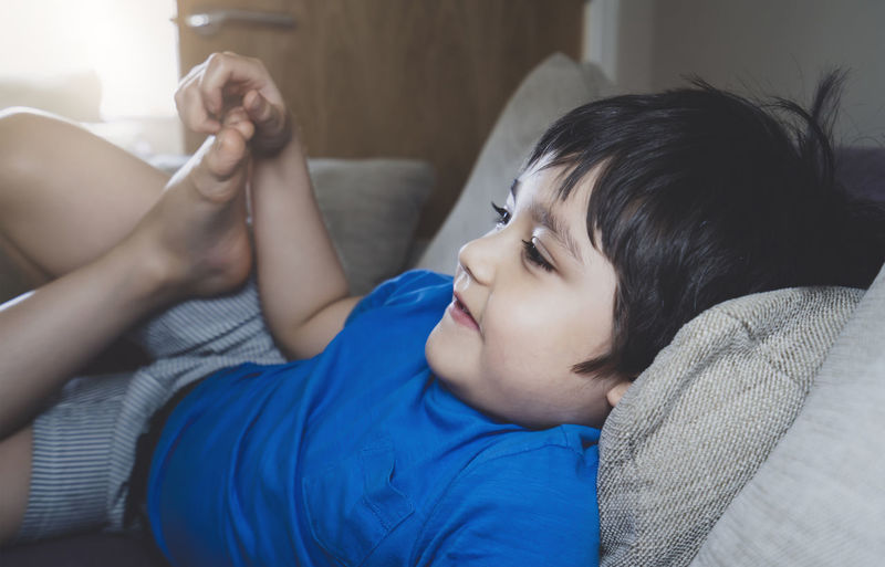 Portrait of boy relaxing at home