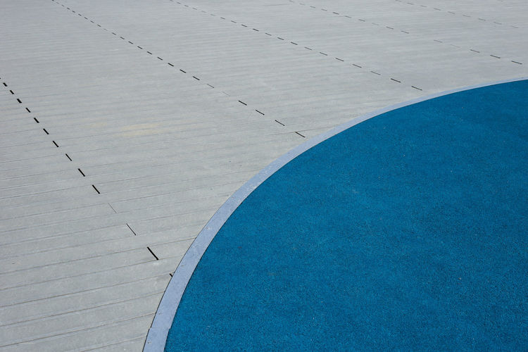 High angle view of blue walkway
