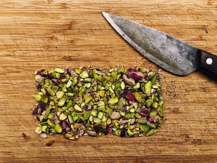 High angle view of chopped on cutting board on table