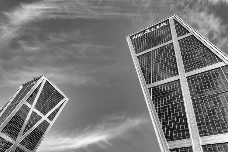 Low angle view of skyscraper against sky