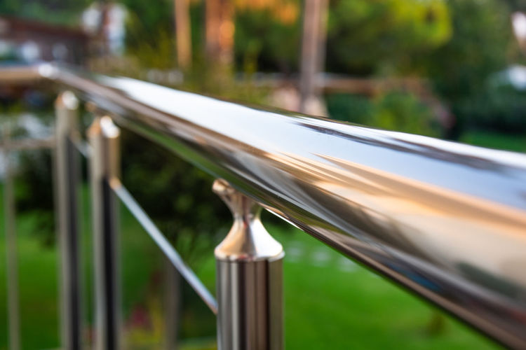 Close-up of metal fence against blurred background