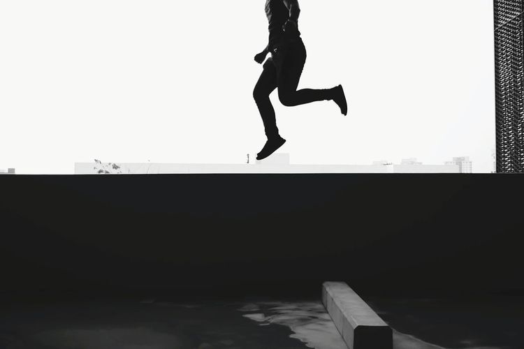 Woman jumping in mid-air