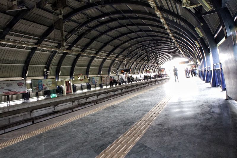 People walking in tunnel
