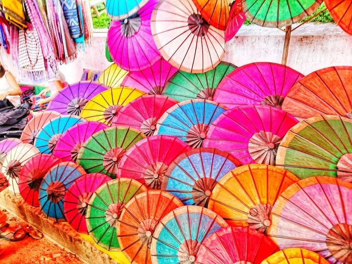 Full frame shot of multi colored umbrellas for sale at market stall
