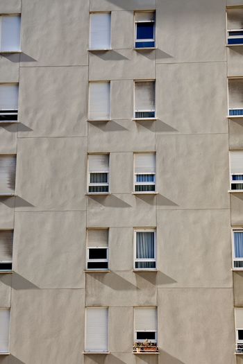Windows on the facade of the building, architecture in bilbao city, spain