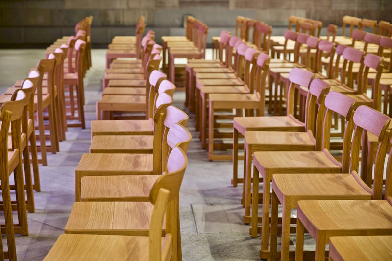 Row of chairs and tables at temple
