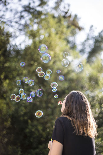 Woman in bubbles
