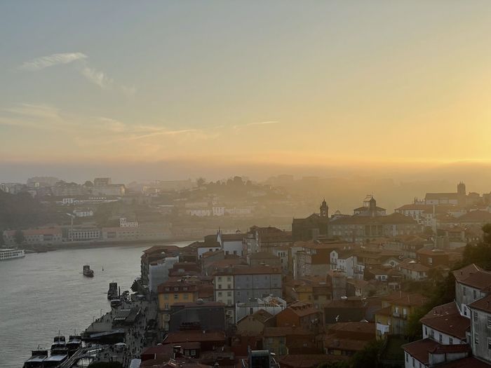High angle view of townscape against sky during sunset