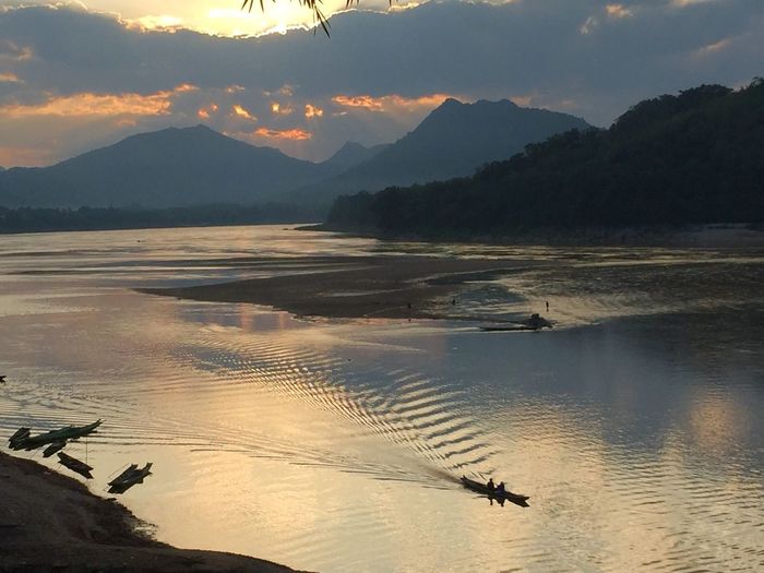 High angle view of mekong river against cloudy sky during sunset
