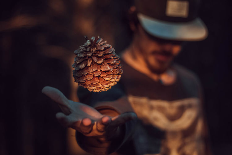 Close-up of man with cone 