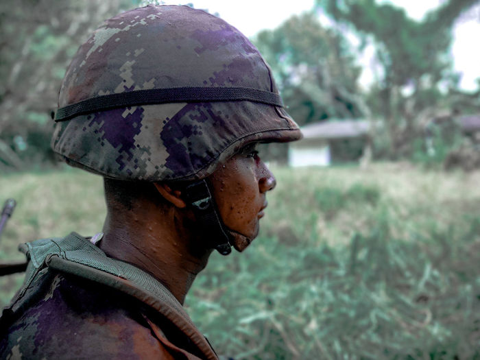 Side view of soldier standing outdoors