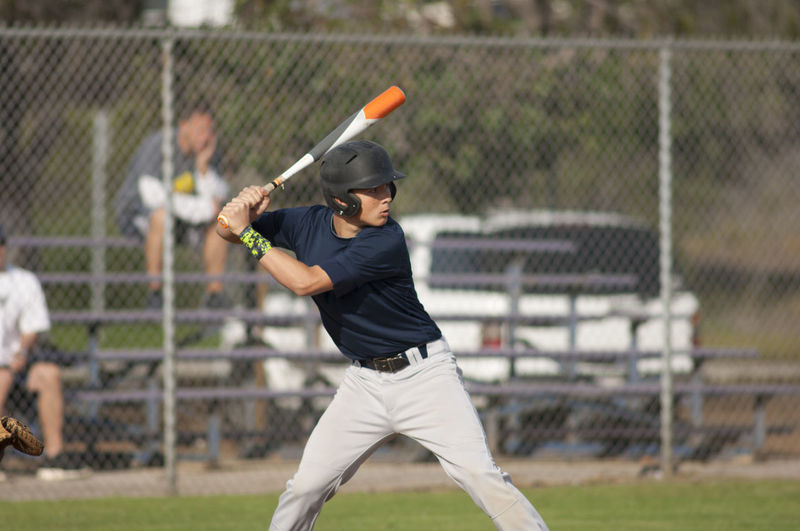 Teen baseball player ready to swing in the batters box