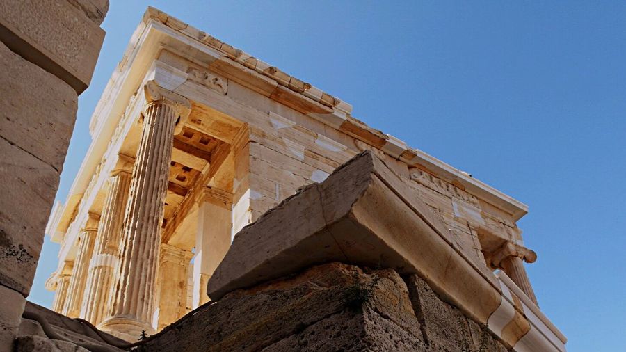 Low angle view of parthenon against clear sky