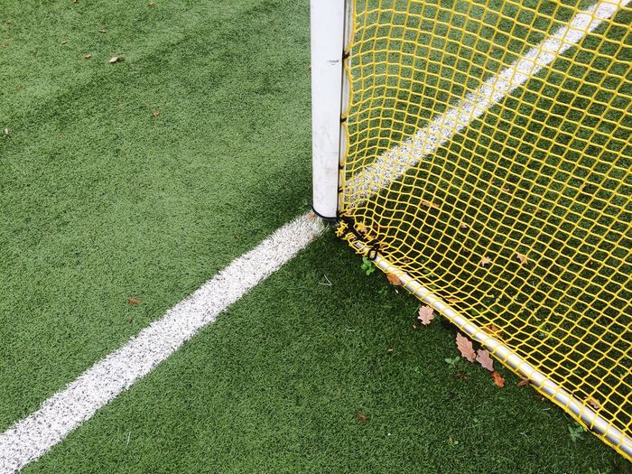 Close-up of net on soccer field
