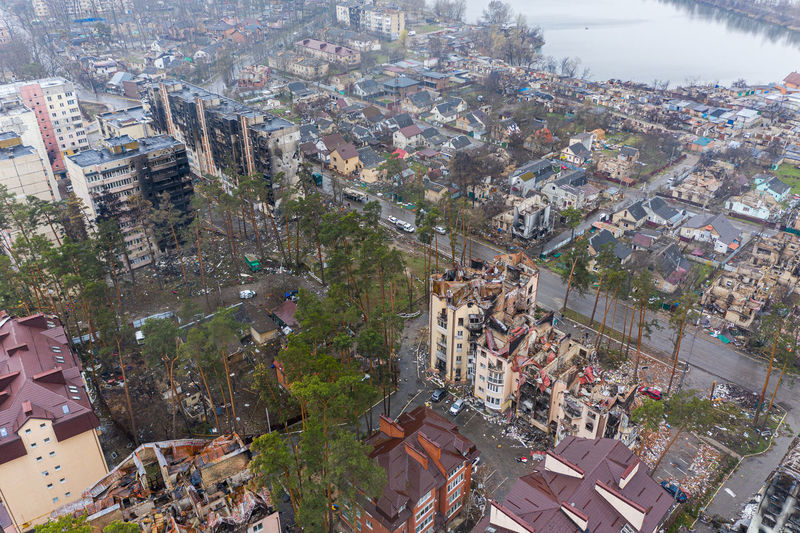 The aerial view of the destroyed and burnt buildings. 