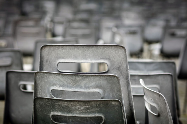 Close-up of empty chairs at st peter square
