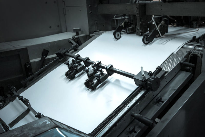 Close-up of blank paper in printing press
