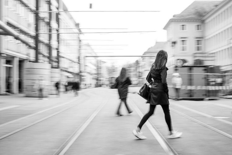 Full length of woman standing in city