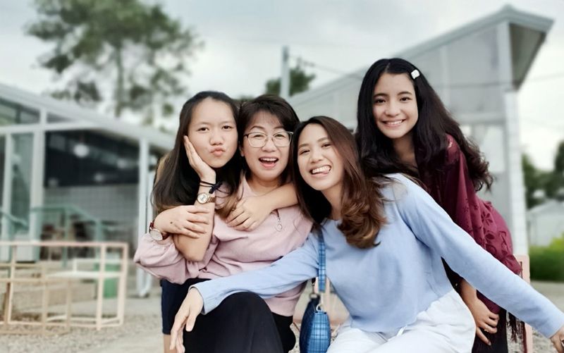 Portrait of smiling women outdoors