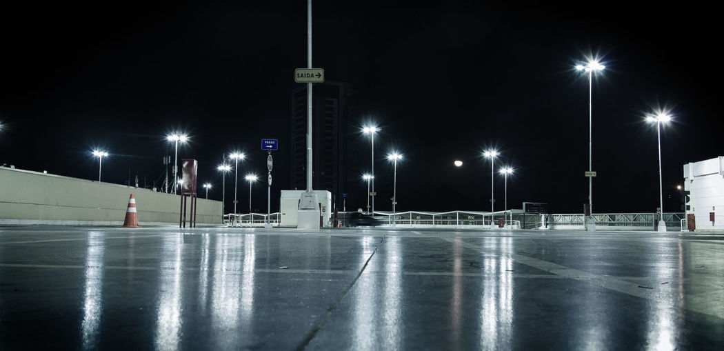 Empty parking lot at night