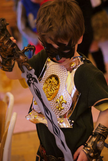 Close-up of boy in knight costume during party