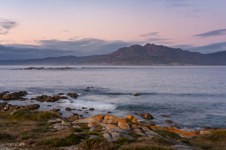 Caldebarcos panorama view of landscape with mountains at sunset with atlantic ocean in galicia