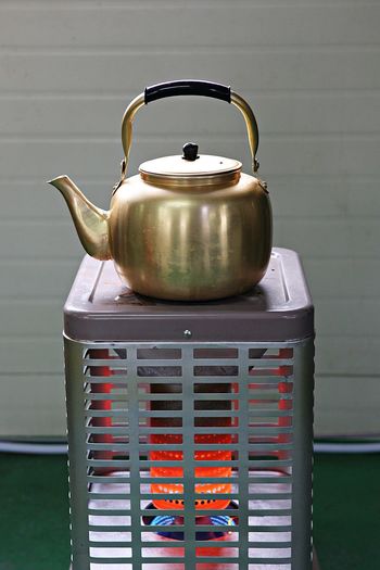 Close-up of tea pot on stove