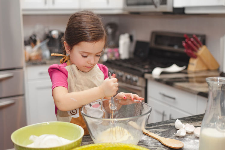 Girl preparing food at home