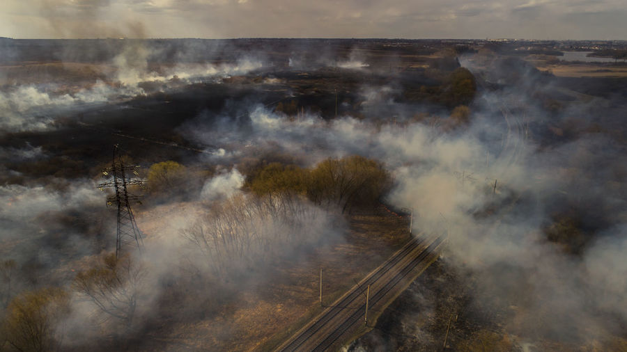 High angle view of smoke emitting from railroad track