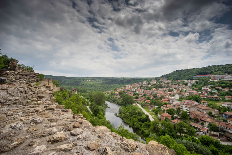Beautiful landscape over veliko tarnovo from tsarevets fortress with dramatic cloudy sky