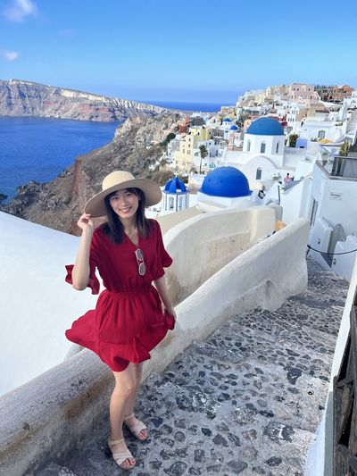Asian female visiting santorini, greece